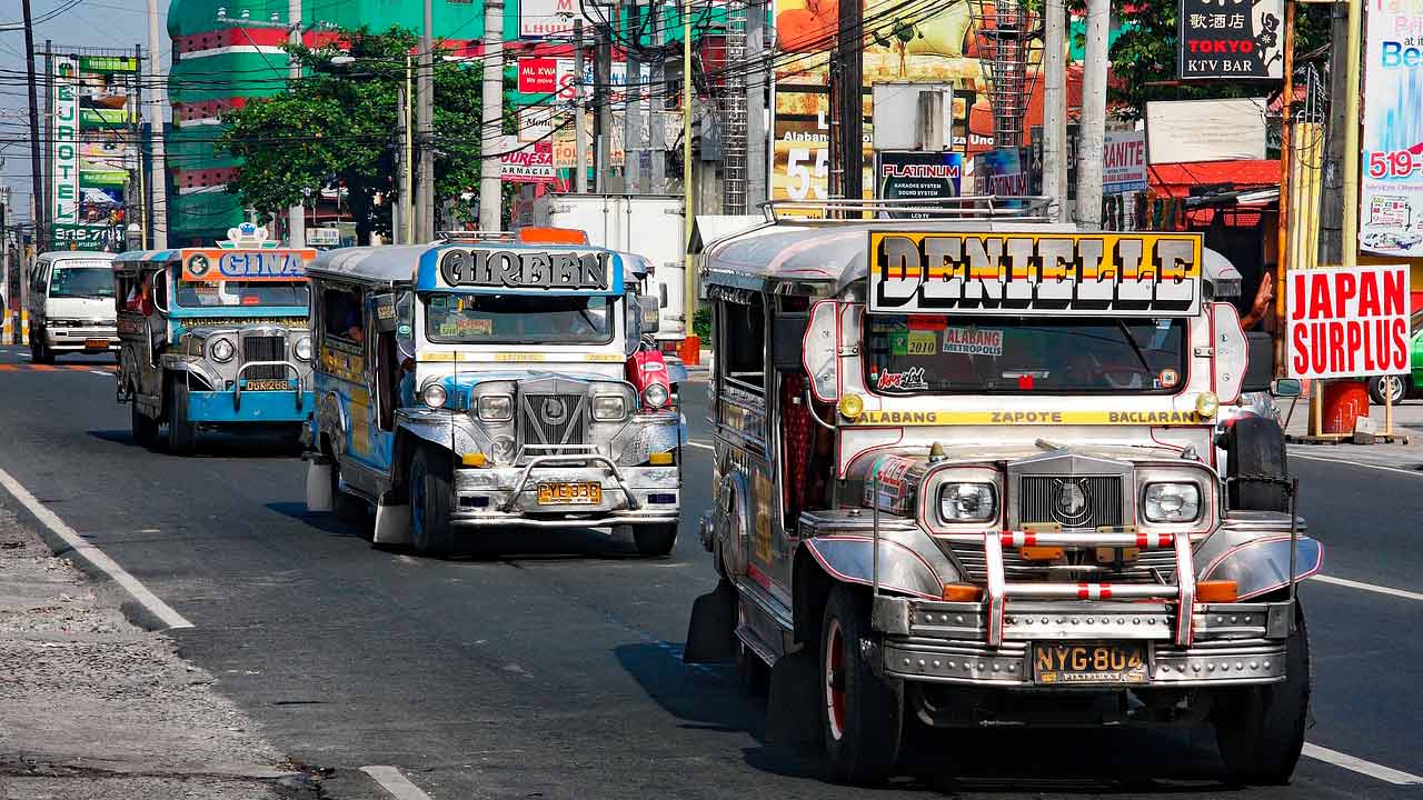 A colorful Jeepney on the streets of the Philippines, representing local travel.